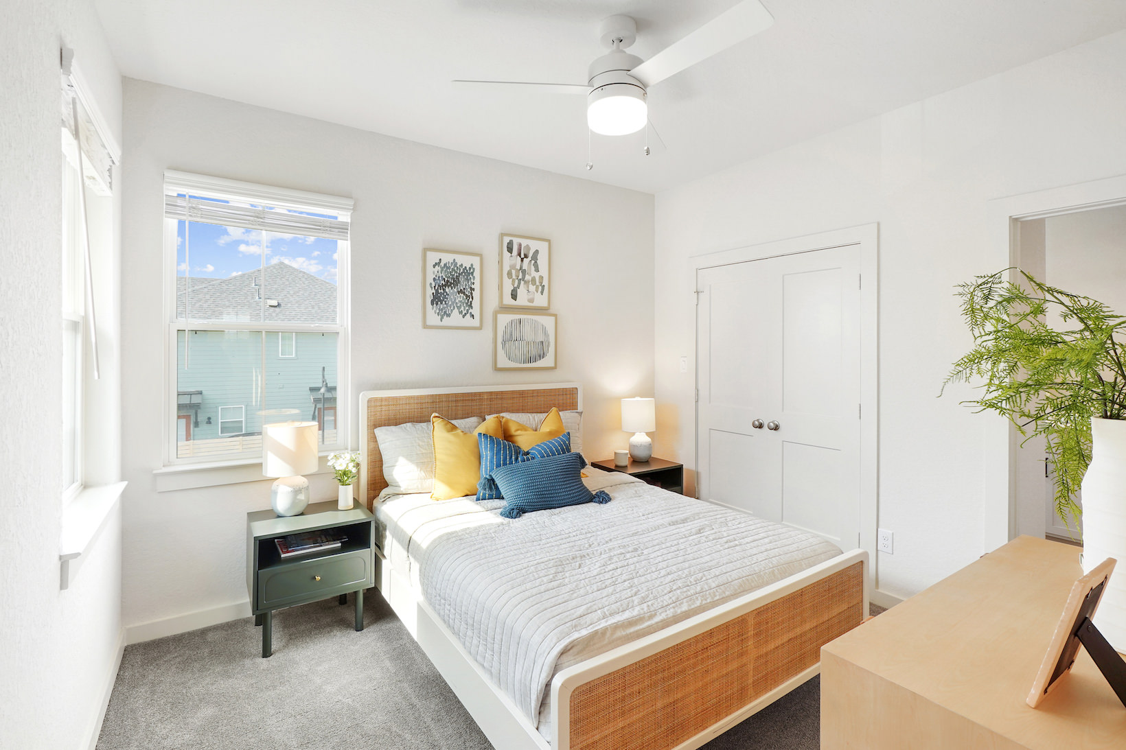 Cozy bedroom with natural light and simple furnishings Cozy bedroom with natural light and simple furnishings